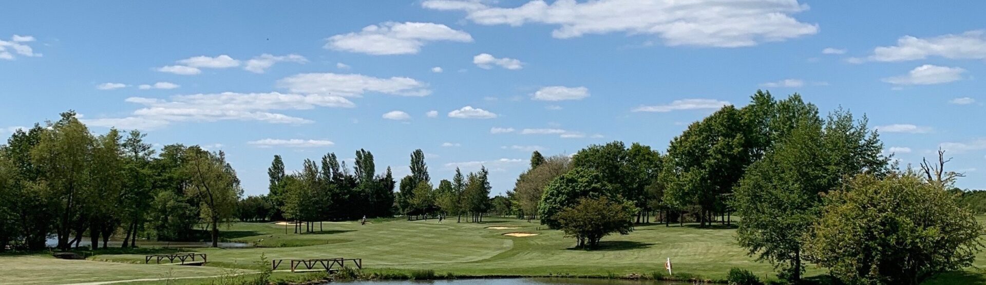 Golf course around lake